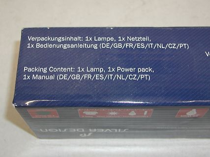 Verpackungsinhalt einer Lampe auf Karton