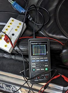 Hantek Handheld Oszilloskop mit Messaufbau