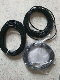 Drei Rollen schwarzes Kabel