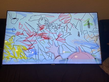 Abfotografierter Fernseher mit Zeichentrickbild