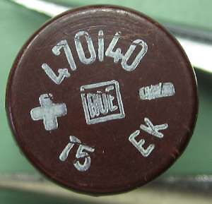 Beschriftung auf einem runden Bauteil oder Deckel