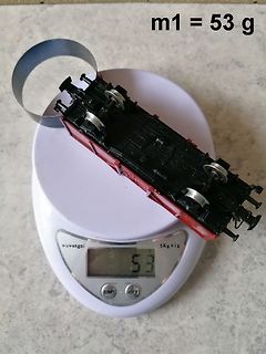 Modellbahnwagen auf digitaler Waage