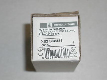 Verpackung eines Telemecanique Pilztaster-Druckknopfs