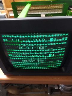 Abfotografierter CRT-Monitor mit Fehlermeldung