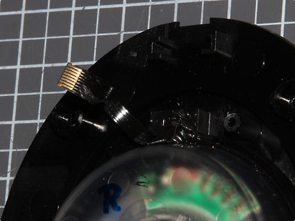 Flexbandkabel in einem schwarzen Kunststoffgehäuse