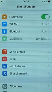 Abfotografierter Smartphone-Bildschirm mit Einstellungen