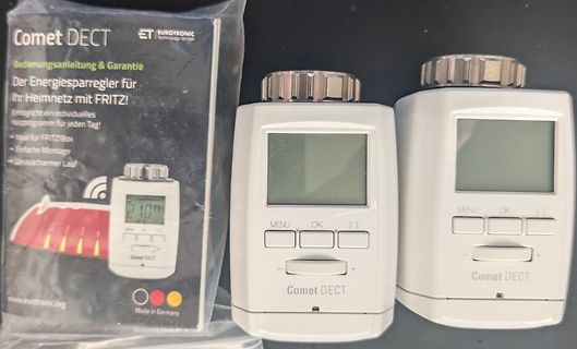 Zwei Comet DECT Heizungsregler und Bedienungsanleitung