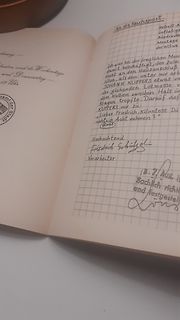 Handschriftlicher Brief in einem Notizbuch