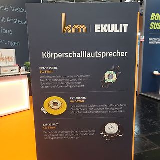 Werbeplakat für Ekulit Körperschalllautsprecher