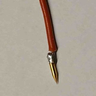 Beschädigtes Kabel mit Lötstelle