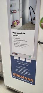 Werbeplakat für eine Stahl-Innentür