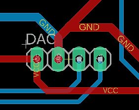 Ausschnitt eines PCB-Layouts mit Leiterbahnen und Bauteilen