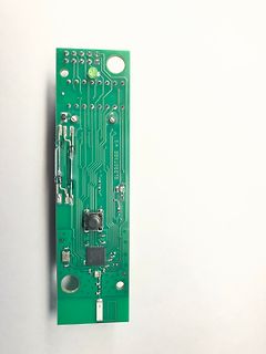 Grüne Leiterplatte mit elektronischen Bauteilen
