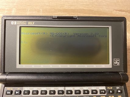 HP 95LX Palmtop mit MS-DOS Startbildschirm