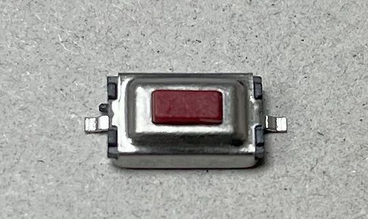 Taktiler Drucktaster mit rotem Knopf