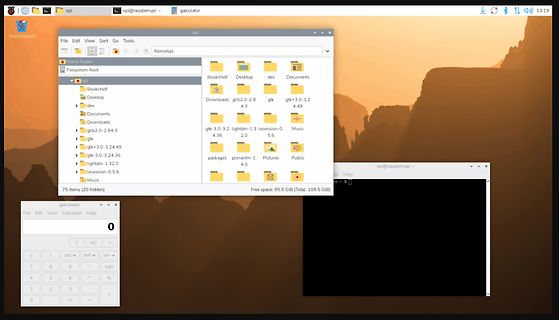 Desktop-Screenshot eines Linux-Betriebssystems mit Dateimanager und Taschenrechner