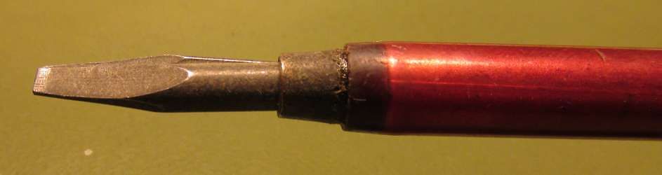 Spitze eines roten Schraubendrehers