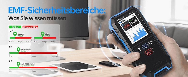 Hand hält EMF-Messgerät vor Monitor