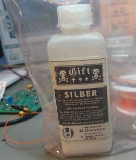Flasche mit Silber-Lösung zur Versilberung