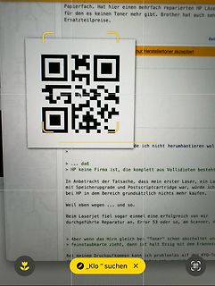 Foto eines Bildschirms mit Text und QR-Code