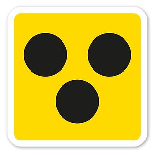 Logo mit drei schwarzen Kreisen auf gelbem Grund