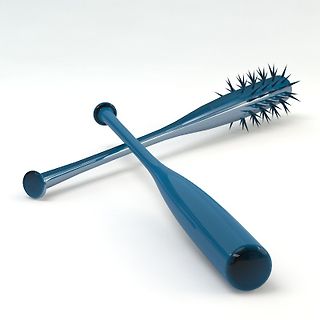 Zwei blaue, stachelige Gegenstände kreuzweise liegend