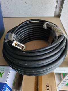 Coiled black cable with DVI connector
