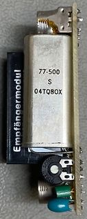 Elektronikmodul mit Metallgehäuse und Bauteilen