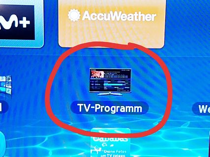 Abfotografierter Bildschirm mit TV-Programm-Icon