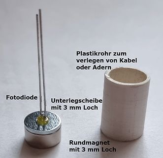 Fotodiode, Unterlegscheibe, Plastikrohr und Rundmagnet