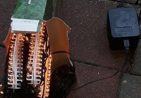 Lichterkette in Karton und Netzteil