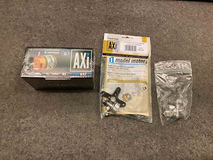 Verpackung und Inhalt eines Axi Model Motors Montagesets