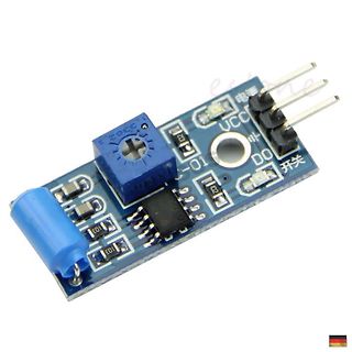 Kleine blaue Leiterplatte mit elektronischen Bauteilen