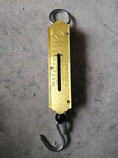 Goldfarbene Taschenwaage