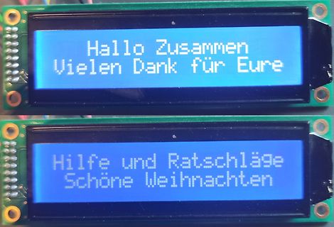 Zwei LCD-Displays mit deutschem Text