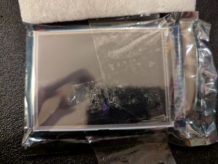 LCD-Display in Schutzfolie und Plastikverpackung
