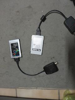 PC-Card Ethernet Adapter mit Kabeln