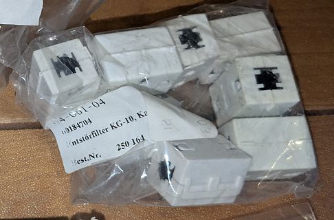 Entstörfilter KG-10 in Plastikverpackung