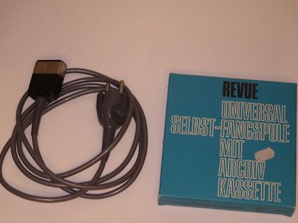 Netzkabel und Verpackung einer Revue Universal Selbst-Fangspule