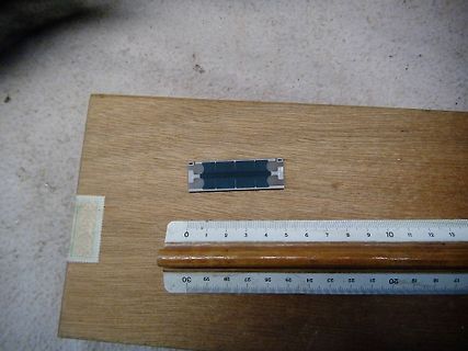 Bauteil mit Lineal zur Größenbestimmung