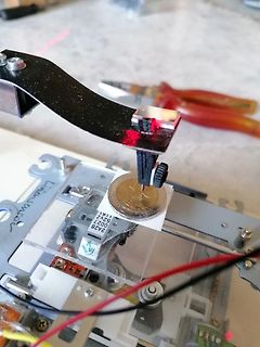 Reparatur oder Modifikation eines CD-Laufwerks mit Münze