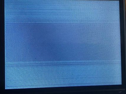 Abfotografierter blauer Bildschirm mit Pixelstruktur