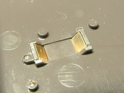 Makroaufnahme einer Leiterplatte mit Bauteilpad