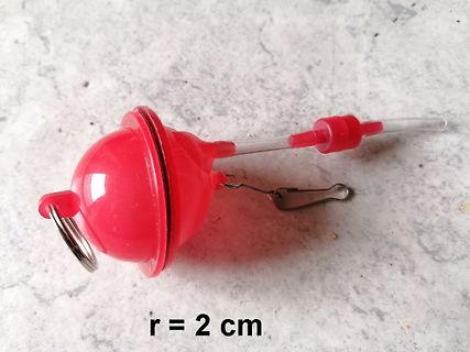 Roter Schwimmer mit Maßangabe