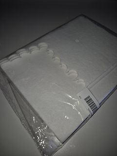Verpackte weiße Textilien oder Stoffe