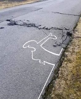 Straßenmarkierung in Form einer Person