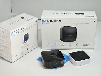Verpackung und Geräte von Blink Outdoor und Mini Kameras
