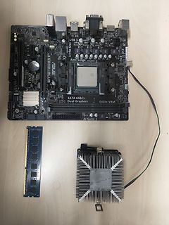 ASUS Computer Mainboard mit RAM und CPU-Kühler