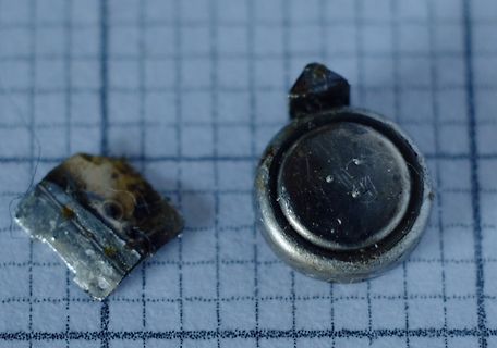 Beschädigte Knopfzellen Batterie