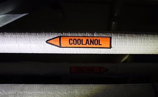 Beschriftung eines Rohres mit COOLANOL